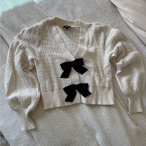 Cream Sweater with Black Bow